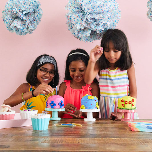 Cake decorating party with birthday cake kits