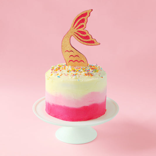Pink ombre frosting on a mermaid cake