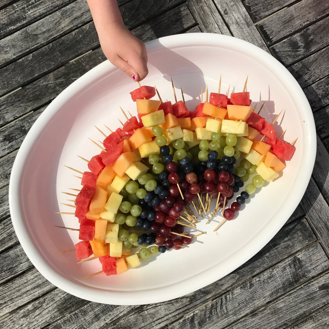 Kids party food, rainbow fruit skewers