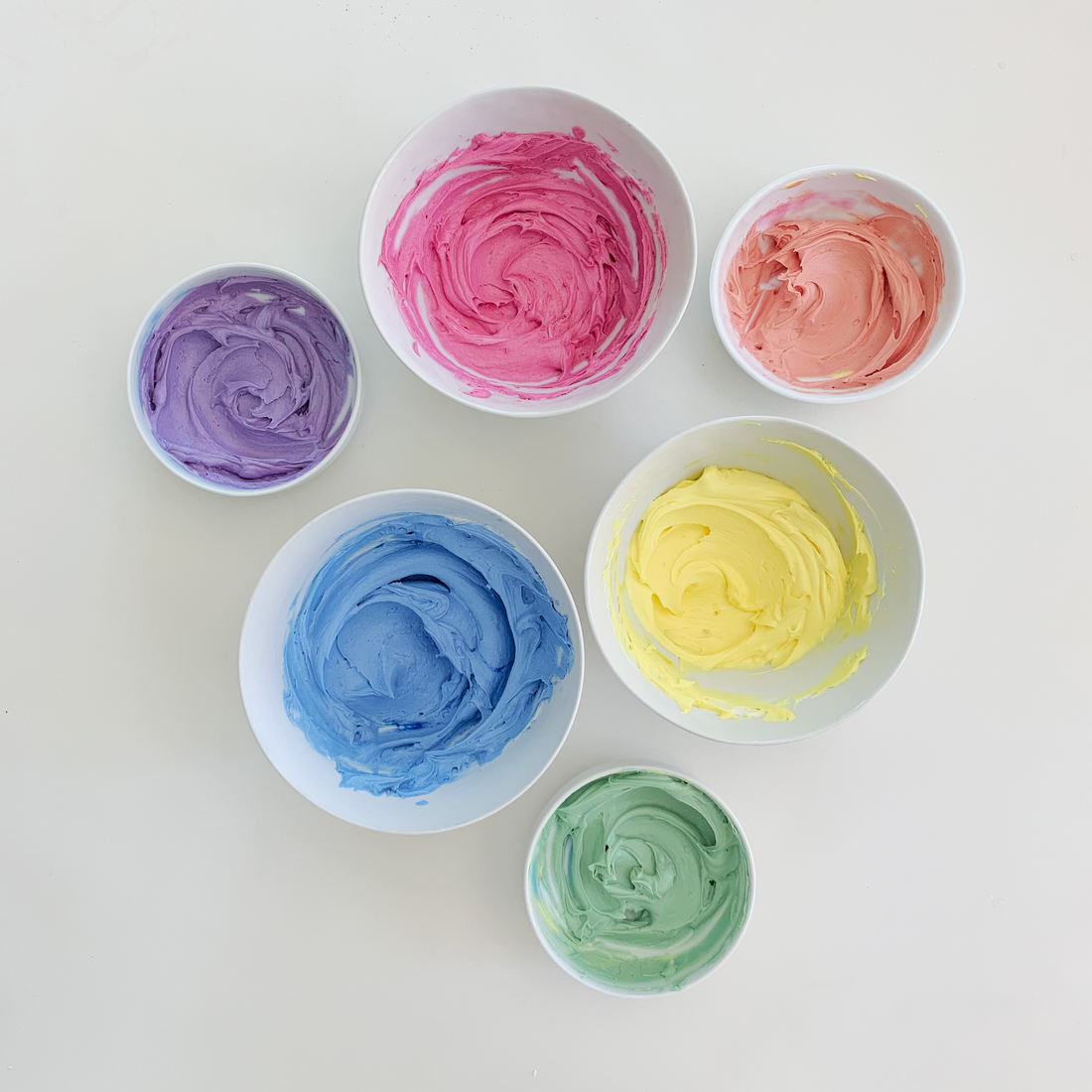 Natural food coloring mixed into fluffy buttercream
