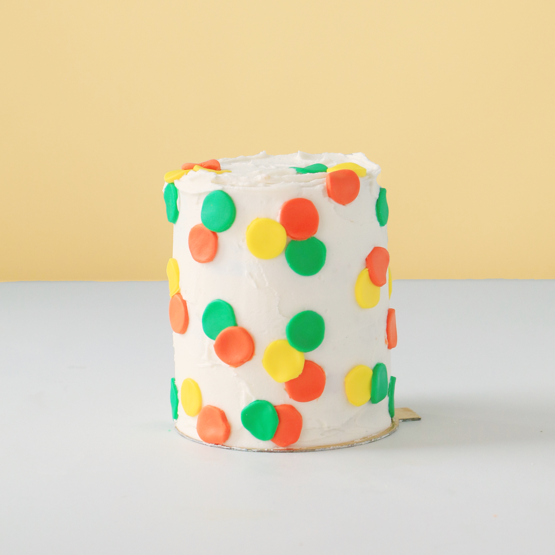 Tall cake with dots