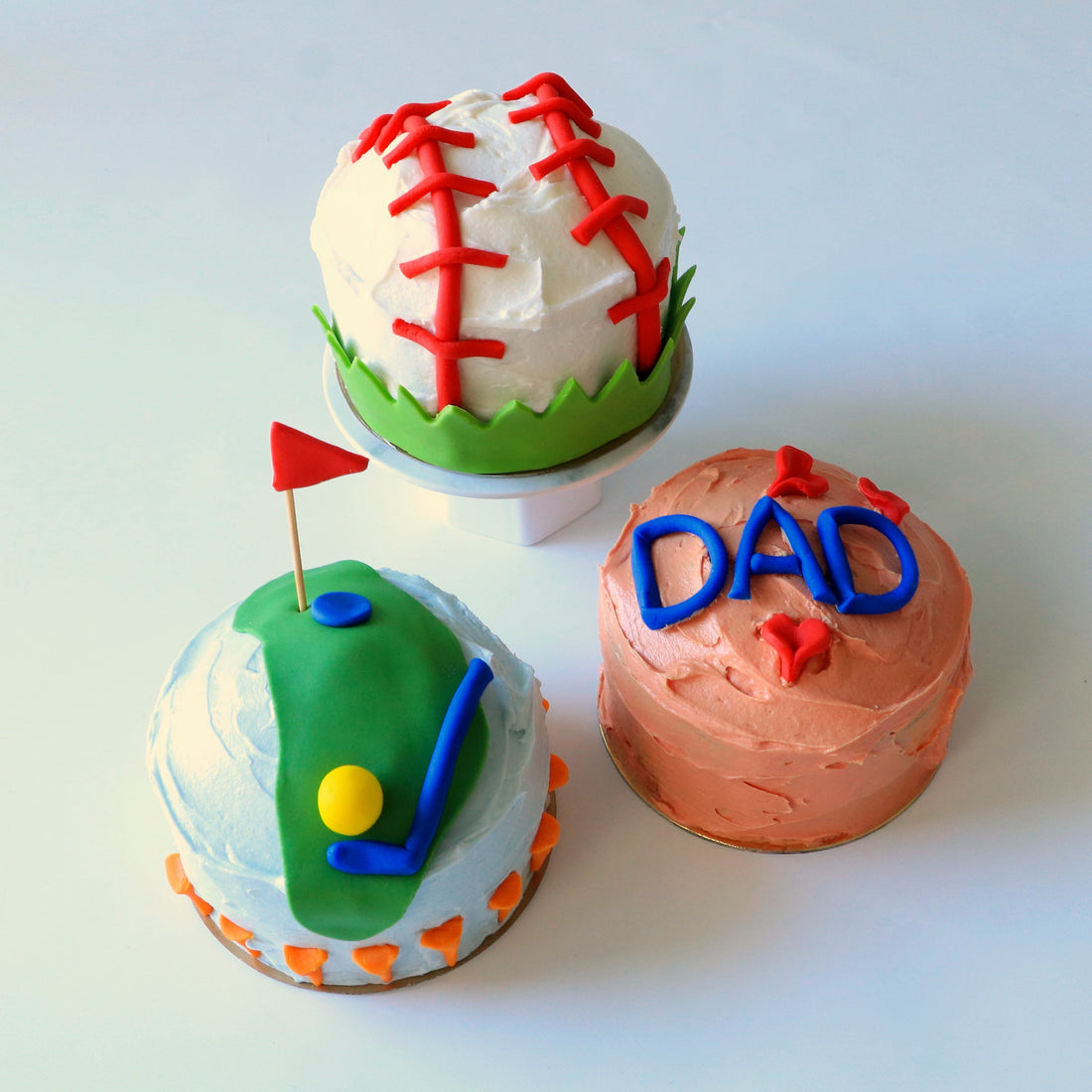 Sport themed mini cakes decorated to celebrate Father's Day