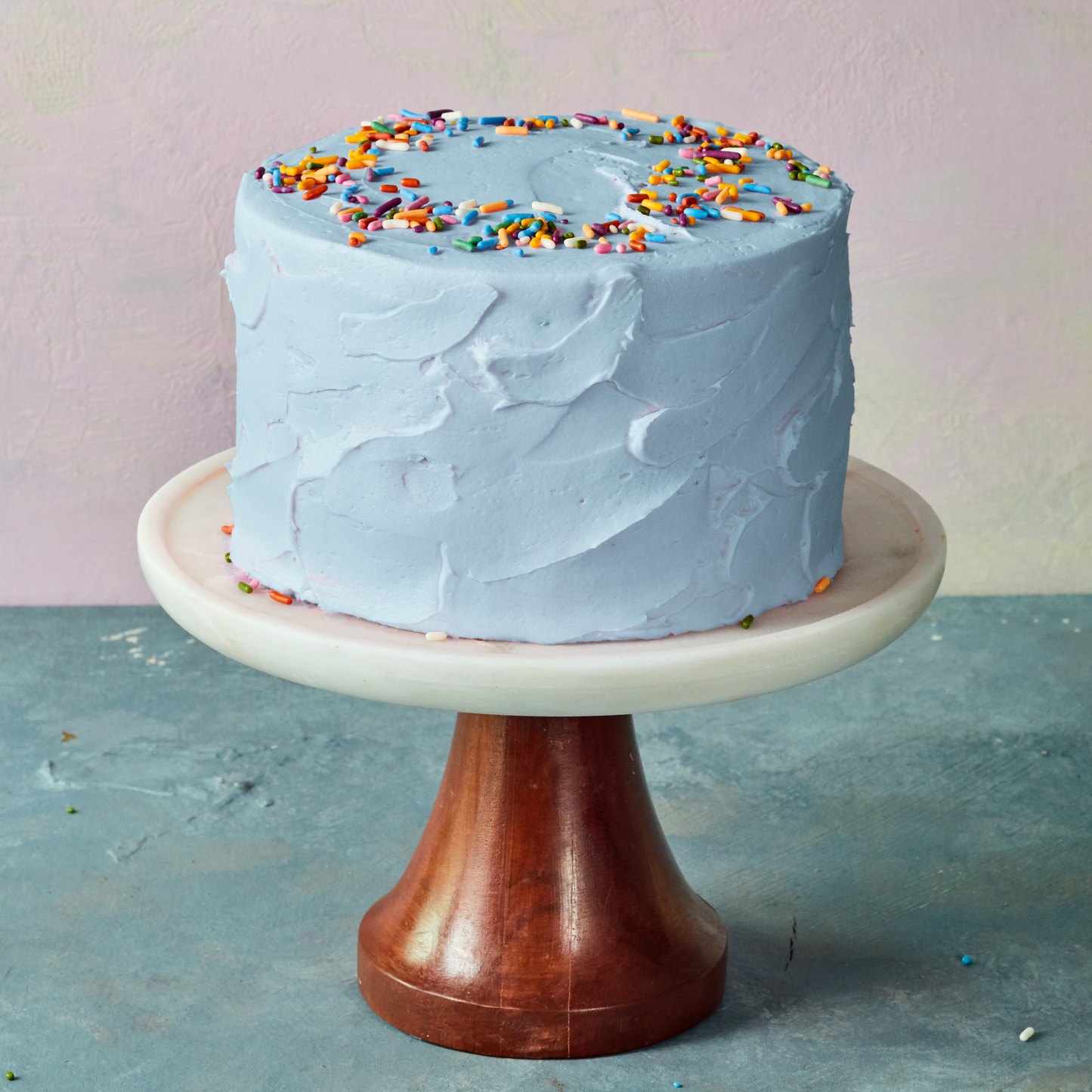 Blue birthday cake with sprinkles