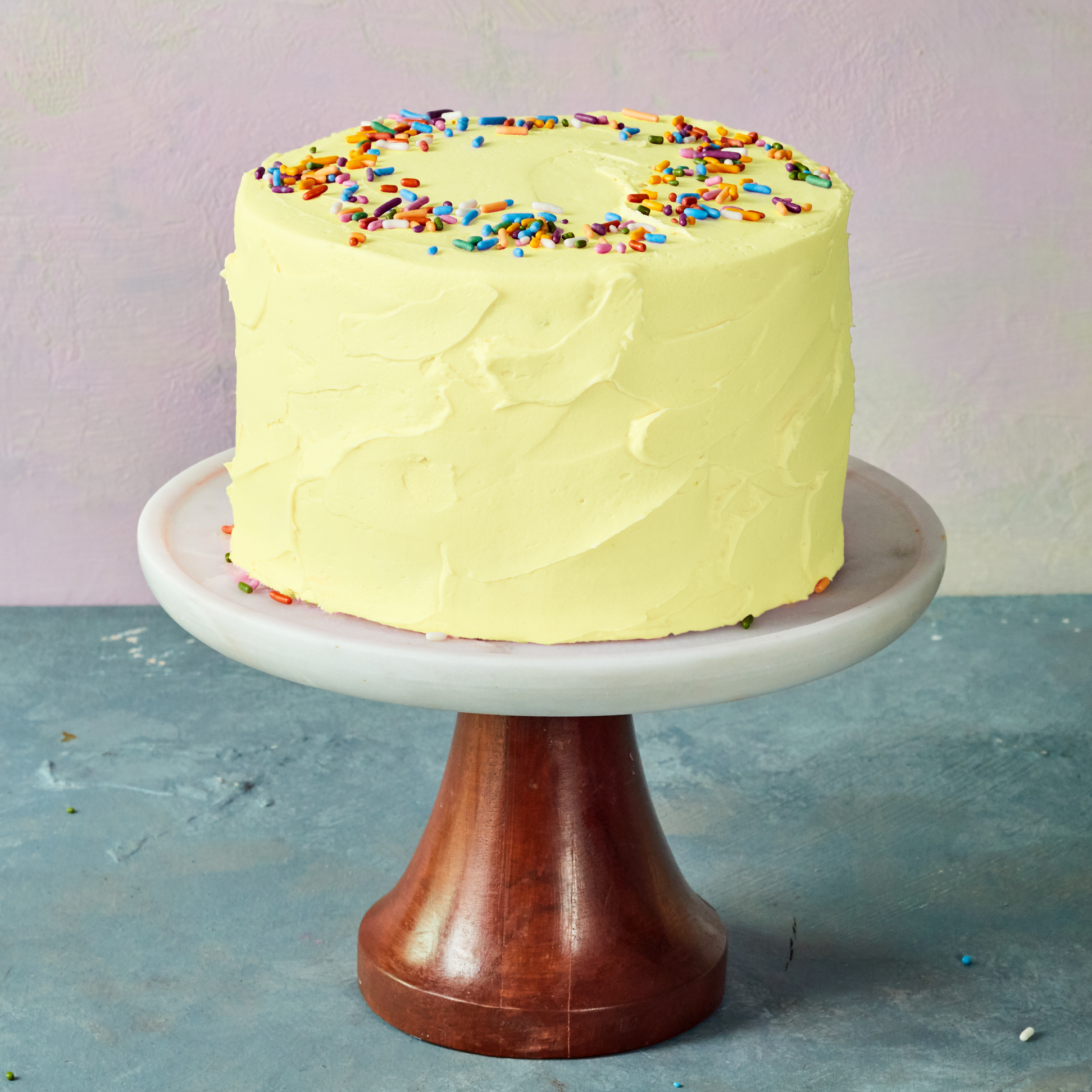 Yellow birthday cake with sprinkles